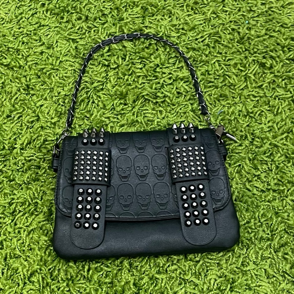Leather bag with metal and studs